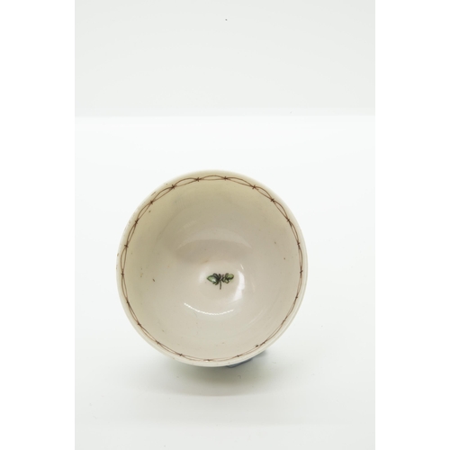 980 - A BRISTOL PORCELAIN TEA BOWL AND SAUCERwith blue 'X' mark and painters marks to bases, 12cm