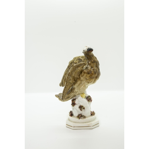 990 - AN ENGLISH PORCELAIN MODEL OF AN EAGLECirca 1830, 19cms high