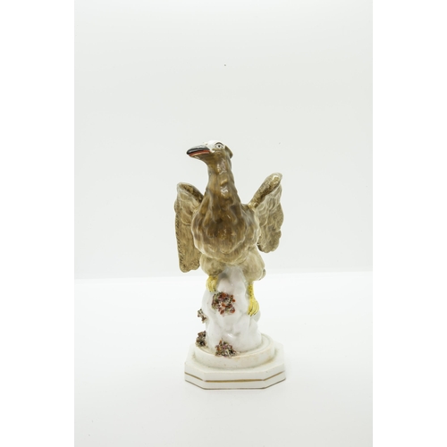 990 - AN ENGLISH PORCELAIN MODEL OF AN EAGLECirca 1830, 19cms high