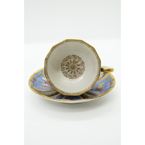 991 - A FRENCH CABINET CUP AND SAUCERCirca 1820, manner of Jacob Petit, 13.5cms