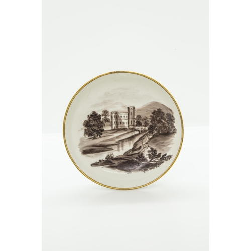 995 - A CUP AND SAUCER BY MARY SMITHdated April 14th 1813 and painted a sepia landscape, 14cms