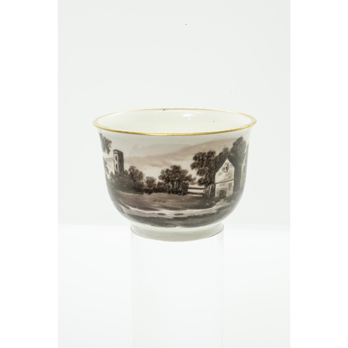 995 - A CUP AND SAUCER BY MARY SMITHdated April 14th 1813 and painted a sepia landscape, 14cms