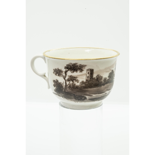 995 - A CUP AND SAUCER BY MARY SMITHdated April 14th 1813 and painted a sepia landscape, 14cms