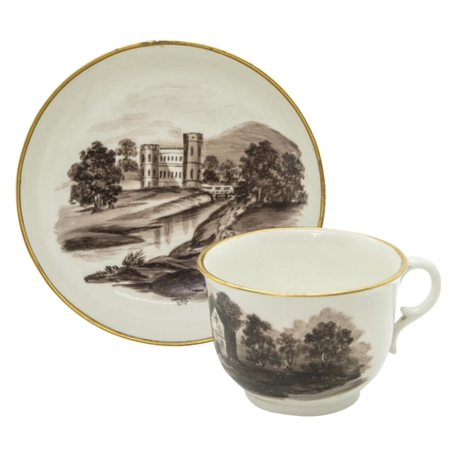 995 - A CUP AND SAUCER BY MARY SMITHdated April 14th 1813 and painted a sepia landscape, 14cms