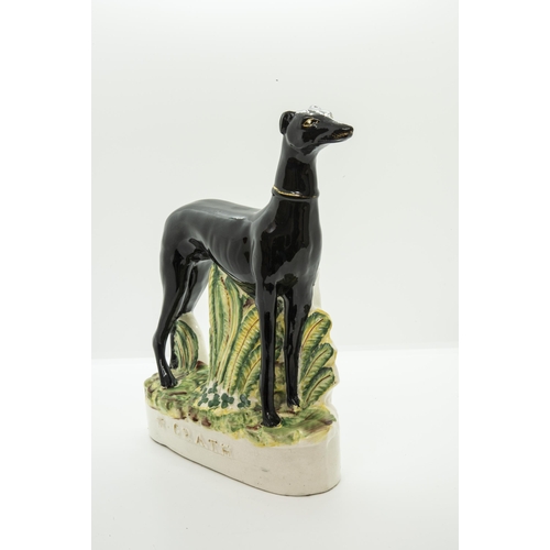 996 - A STAFFORDSHIRE FIGURE 'M GRATH'Circa 1870, depicting the famous racing greyhouud Mr McGrath, 24cms ... 