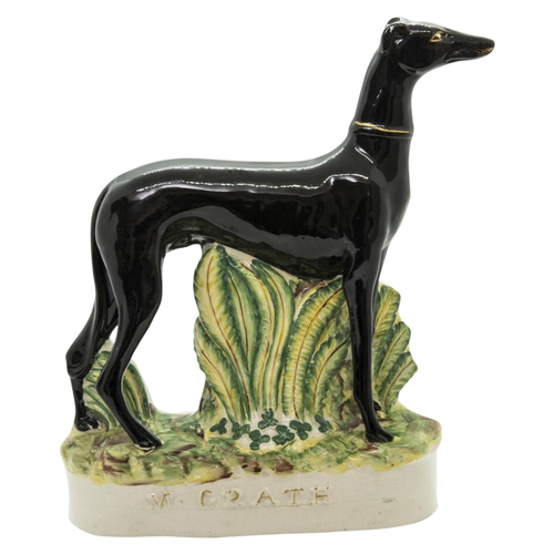 996 - A STAFFORDSHIRE FIGURE 'M GRATH'Circa 1870, depicting the famous racing greyhouud Mr McGrath, 24cms ... 