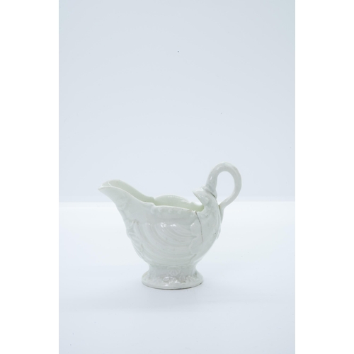 1005 - TWO WORCESTER COFFEE CANSMid 18th Century, together with a shell form butter boat, tallest is 6.5cms... 