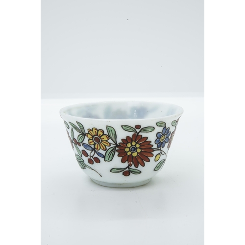 1006 - A MILK GLASS TEA BOWL18th Century, with enameled decoration together with a coffee can with cold pai... 