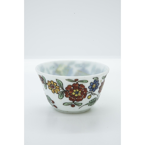 1006 - A MILK GLASS TEA BOWL18th Century, with enameled decoration together with a coffee can with cold pai... 