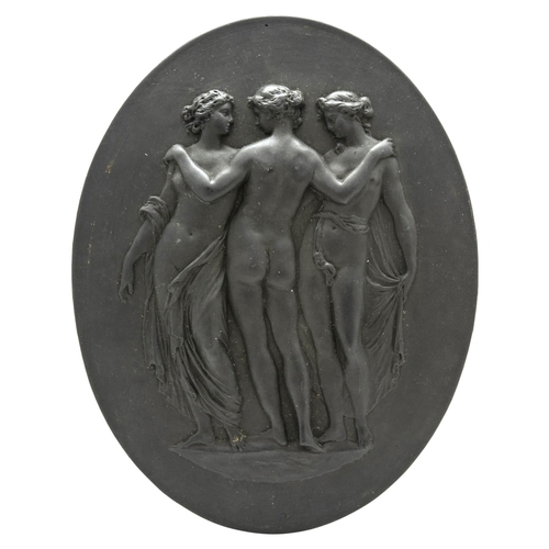 1009 - A WEDGWOOD BASALT PLAQUE18TH century, modeled with the Three Graces, 22cms high