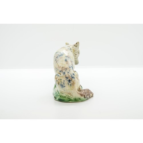 1014 - A WHEILDON TYPE STAFFORDSHIRE FIGURE OF A WOLF18th Century, 11cms