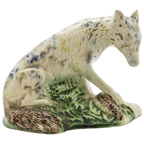 1014 - A WHEILDON TYPE STAFFORDSHIRE FIGURE OF A WOLF18th Century, 11cms