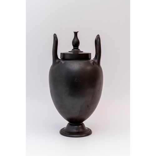 1019 - A BLACK BASALT VASE OF LEBES GAMIKOS FORMLate 18th, 38cms high