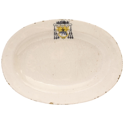 1020 - AN OVAL ITALIAN FAIENCE PLATTER17th Century, painted a Bishops crest, possibly Cansacchi di Amelia, ... 