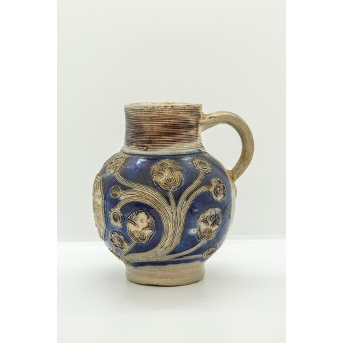 1027 - A WESTERWALD STONEWARE COMMERATIVE JUGDated 1688, 16cms high