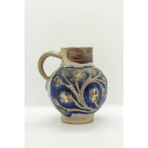 1027 - A WESTERWALD STONEWARE COMMERATIVE JUGDated 1688, 16cms high