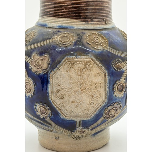 1027 - A WESTERWALD STONEWARE COMMERATIVE JUGDated 1688, 16cms high