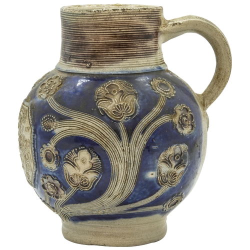 1027 - A WESTERWALD STONEWARE COMMERATIVE JUGDated 1688, 16cms high