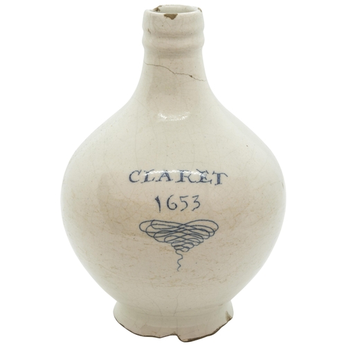 1037 - A LONDON DELFT CLARET JUG DATED 165318.5 cms high