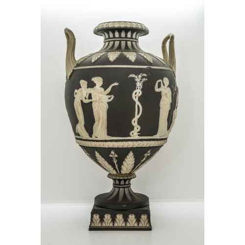 1048 - A WEDGWOOD BLACK JASPER NEOCLASSICAL VASE18th/19th century, 34cms