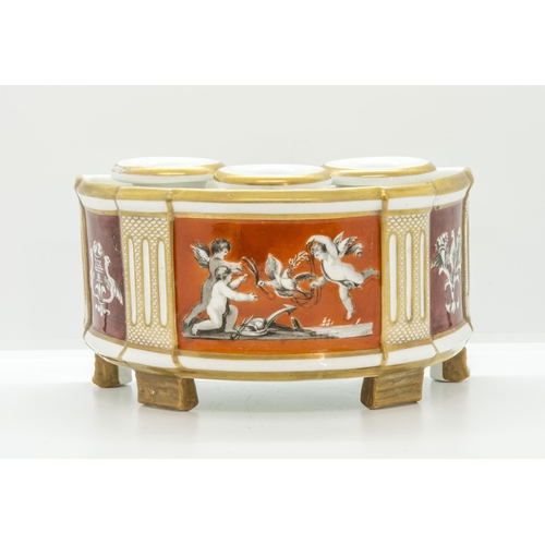 1053 - A PORCELAIN BOUGH POT AND COVEREarly 19th century, painted with cupids on a coral ground, 22cms wide... 