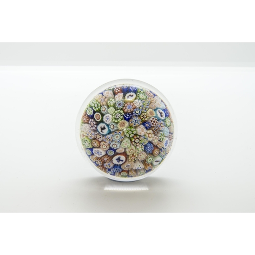 1241 - A BACCARAT MILLEFIORI PAPERWEIGHT DATED 1848With animal and devil canes, 7cms wide