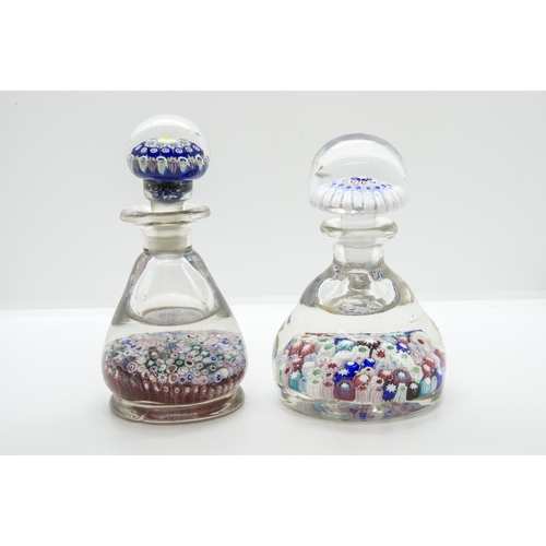 1243 - TWO MILLEFIORI PAPERWEIGHT BOTTLES19th/20th century, tallest is 13cms high