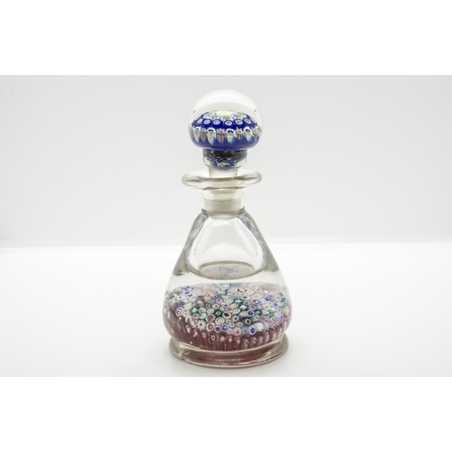 1243 - TWO MILLEFIORI PAPERWEIGHT BOTTLES19th/20th century, tallest is 13cms high