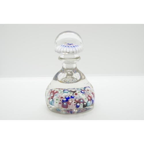 1243 - TWO MILLEFIORI PAPERWEIGHT BOTTLES19th/20th century, tallest is 13cms high