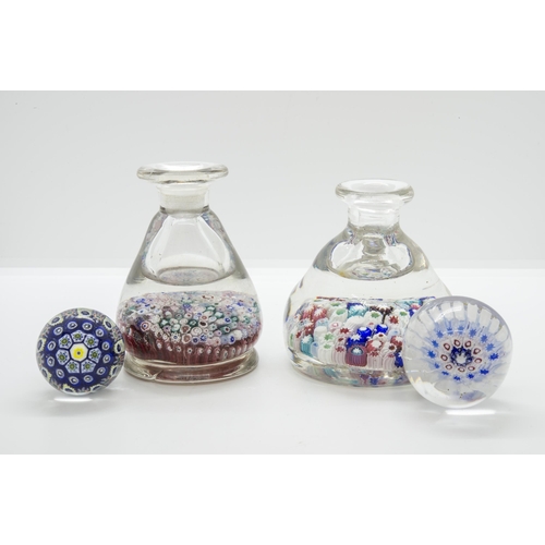 1243 - TWO MILLEFIORI PAPERWEIGHT BOTTLES19th/20th century, tallest is 13cms high