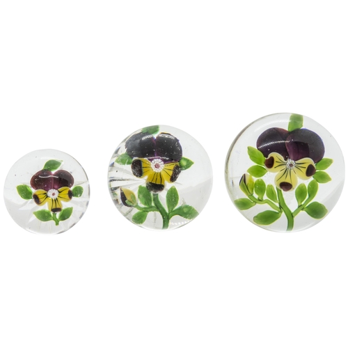 1244 - THREE BACCARAT PANSY PAPERWEIGHTS19th Century, largest is 7.5cms wide