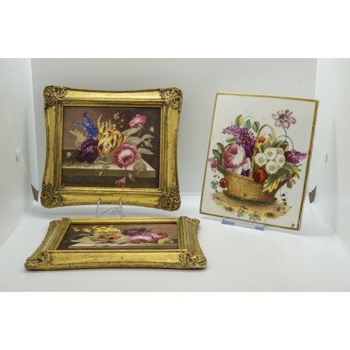 1063 - A PAIR OF PORCELAIN FLORAL PLAQUES AND A FURTHER PLAQUE19th century, the pair in gilt frames, larges... 