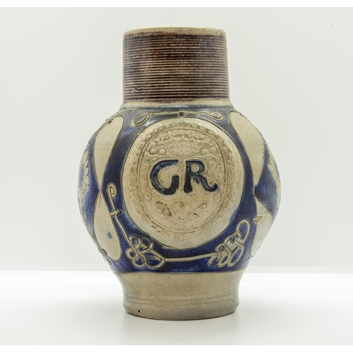 1065 - A WESTERWALD STONEWARE GEORGE I COMMERERATIVE JUGCirca 1720, 19.5cms high