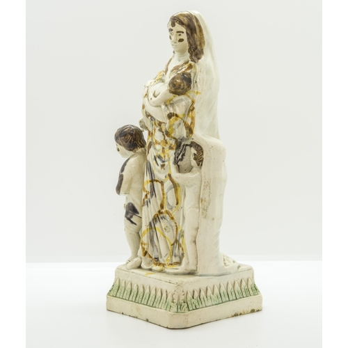 1073 - A STAFFORDSHIRE FIGURE OF CHARITY IN PRATT COLOURSCirca 1800, 24cms high