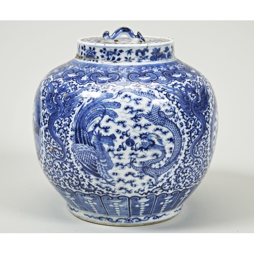 2107 - A CHINESE BLUE AND WHITE 'DRAGON & PHOENIX' JAR AND COVERLATE QING DYNASTYwith an apocryphal Kan... 