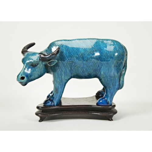 2108 - A CHINESE TURQUIOSE-GLAZED FIGURE OF AN OXLATE 19TH / EARLY 20TH CENTURYon a fitted hardwood stand12... 