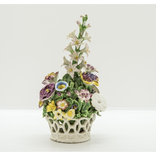 1078 - AN MID EIGTHENTH CENTURY BASKET OF FLOWERSWith old collectors label 'HMC Chelsea' to base, 18cms hig... 