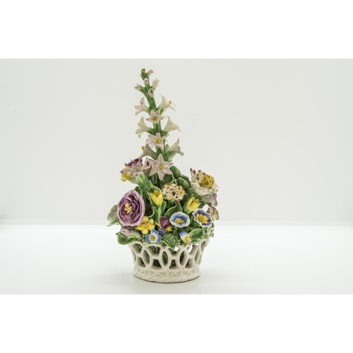 1078 - AN MID EIGTHENTH CENTURY BASKET OF FLOWERSWith old collectors label 'HMC Chelsea' to base, 18cms hig... 