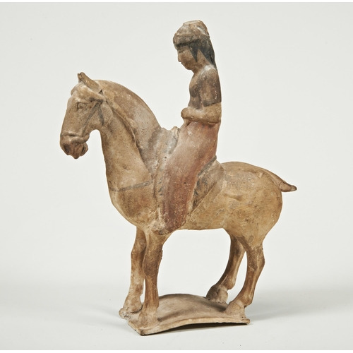 2109 - A CHINESE POTTERY HORSE AND RIDERPROBABLY TAND DYNASTY29cm high