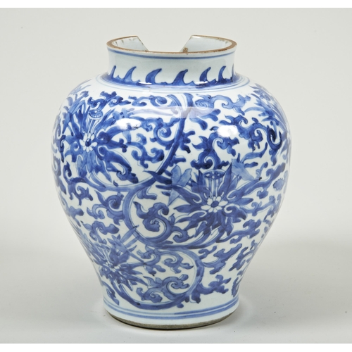 2112 - A CHINESE BLUE AND WHITE 'LOTUS' JARTRANSITIONAL, 17TH CENTURY29cm high