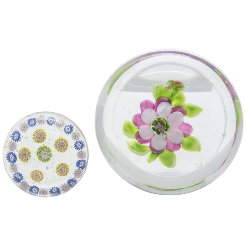 1254 - A FLOWER PAPERWEIGHT AND A SMALL MILLEFIORE WEIGHTLate 19th century, largest is 8cms