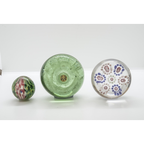 1258 - A MILLEFIORE PAPERWEIGHT19th century with seven concentric circles, together with a 'Sunderland' dum... 