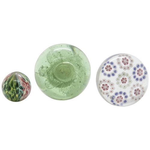 1258 - A MILLEFIORE PAPERWEIGHT19th century with seven concentric circles, together with a 'Sunderland' dum... 