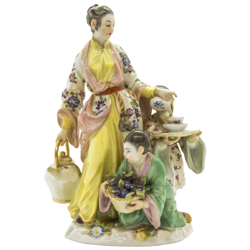 1096 - A MEISSEN FIGURAL GROUP OF JAPANESE WOMAN WITH A TEA KETTLE AND TWO CHILDREN20th century, with blue ... 