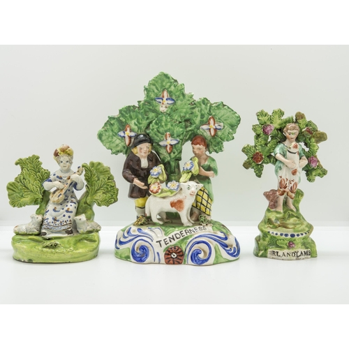 1099 - A RLAPH SALT PEARLWARE BOCAGE FIGURECirca 1830, entitled 'GIRL AND LAMB' together with another figur... 