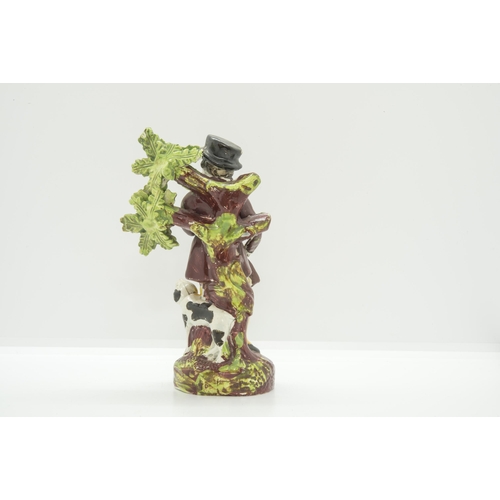 1105 - A PEARLWARE FIGURE OF A SPORTSMANCirca 1830, 15.5cms high