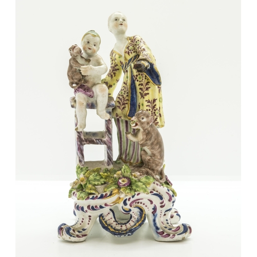 1106 - AN EIGHTENTH CENTURY FIGURE GROUP OF A WOMAN HER CHILD AND MONKIESCirca 1760, possibly Bow, 19 cms h... 