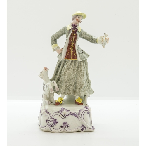 1107 - A MID EGHTEENTH CENTURY FIGURE OF A SPORTSWOMANCirca 1760, raised on a rectangular rococo plinth, wi... 