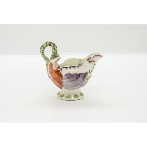 1114 - A WORCESTER DOLPHIN EWER SAUCE BOATCirca 1760, 8.5cms high