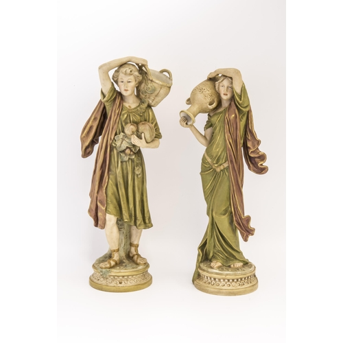 1115 - A PAIR OF ROYAL DUX FIGURES 884 AND 88520th century 44cms high